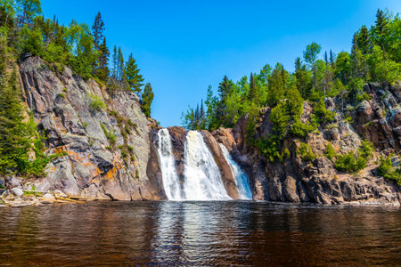 A scenic view of High Falls in Tettegouche State Parkの写真素材