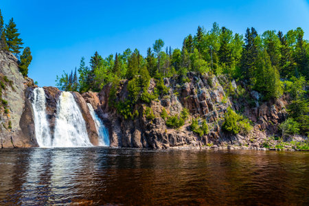 A scenic view of High Falls in Tettegouche State Parkの写真素材