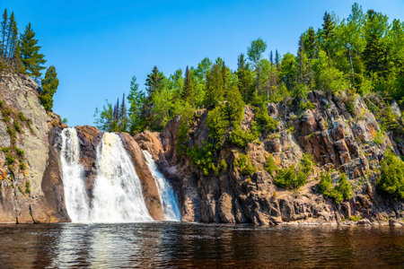 A scenic view of High Falls in Tettegouche State Parkの写真素材