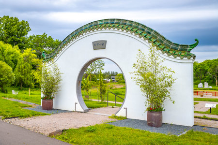 Chinese Garden at Minnesota Landscape Arboretum with Gate title: Under Heaven one familyの写真素材
