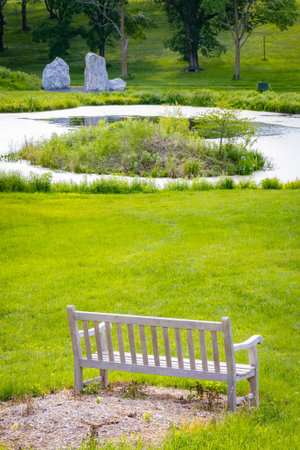Lush plants and scenic buildings on sunny summer dayの写真素材