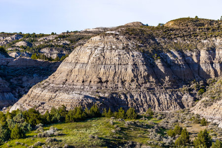 Scenic vibrant view of Roosevelt National Park colorful Canyons under sunset sunの写真素材