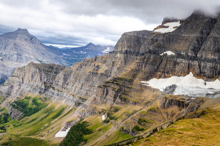 A panoramic view captures the stunning landscape of Glacier National Park from the popular Siyeh...