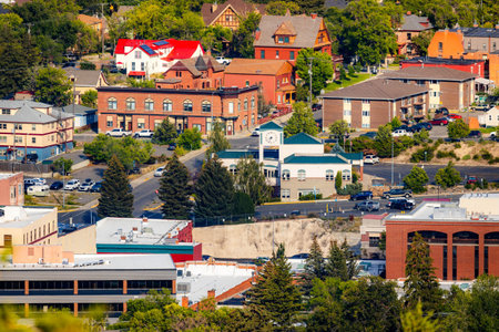 A panoramic aerial view of the city of Helena, Montana is captured at sunset, showcasing the urban landscapeの写真素材