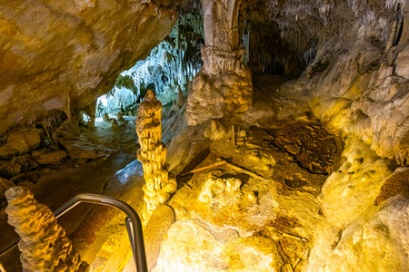 A scenic and illuminated view of the caverns inside Lewis and Clark Caverns State Park is captured, highlighting the stunning geological formations and the unique lighting that enhances their beautyの写真素材