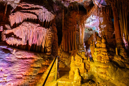 A scenic and illuminated view of the caverns inside Lewis and Clark Caverns State Park is captured, highlighting the stunning geological formations and the unique lighting that enhances their beautyの写真素材