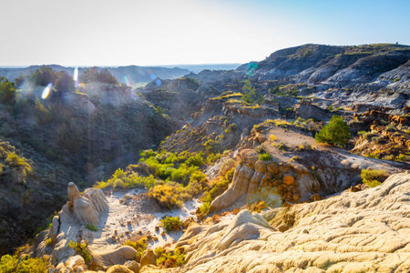 A dramatic sunset over the badlands formations of Makoshika State Park as seen from the Cap Rock...