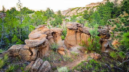 Beautiful formations of rocks and sandstone at dusk on the Kinney Coulee trailの写真素材