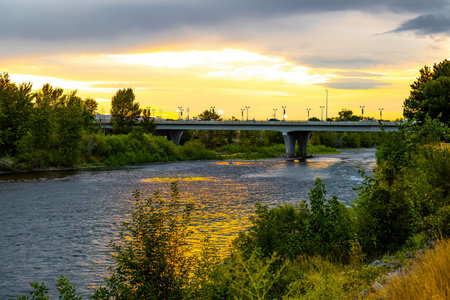 The Orange Street Bridge spans the Clark Fork River, connecting downtown Missoula with the historic Southside neighborhoodの写真素材