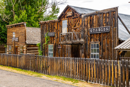 A collection of old, vintage wooden buildings captured at the Living History Museum in Montanaの写真素材