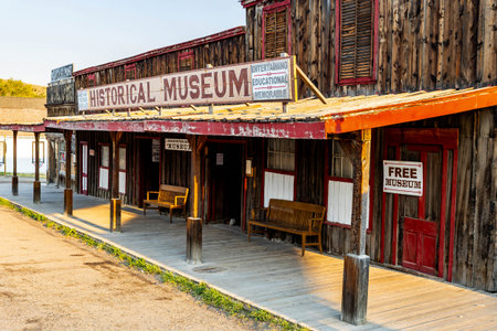 The historic buildings and wooden storefronts of Virginia City, a preserved ghost town and popular tourist destination in Montanaの写真素材