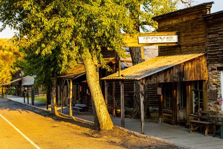 The historic buildings and wooden storefronts of Virginia City, a preserved ghost town and popular tourist destination in Montanaの写真素材