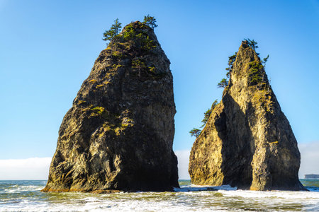 Famous Hole-in-the-Wall rock formation, an iconic arch sculpted by waves on the Pacific Ocean shore...