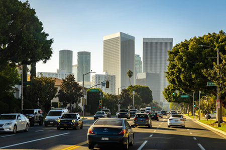 Los Angeles, CA, USA - December 01, 2025: Heavy morning traffic flows between towering skyscrapers...