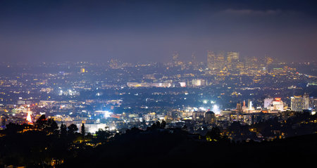 Los Angeles, CA, USA - December 02, 2025: Scenic aerial view shows Hollywood city lights glowing at...