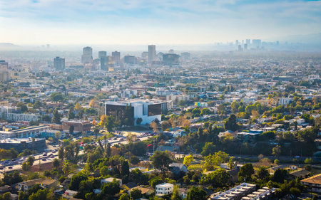 Los Angeles, CA, USA - December 03, 2025: Aerial panorama shows Los Angeles skyscrapers at sunset over downtown Californiaのeditorial素材