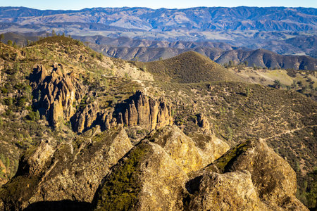 Panoramic view of towering rock spires and needle formations at Pinnacles National Park California...