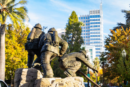 Sacramento, CA, USA - November 10, 2025: Outdoor memorial monument honoring firefighters with...