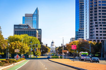 Sacramento, CA, USA - November 12, 2025: Contemporary downtown cityscape featuring tall skyscrapers with the Capitol building visible in the background.