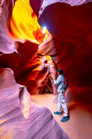 Native Tour Guide Performing Inside Antelope Canyon Arizona