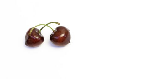red cherries on white backgroundの写真素材