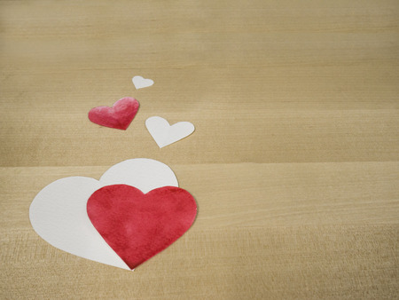 paper hearts on woodの写真素材