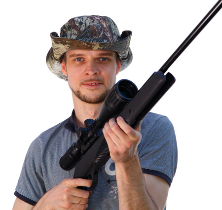 Handsome guy with hunting telescopic rifle