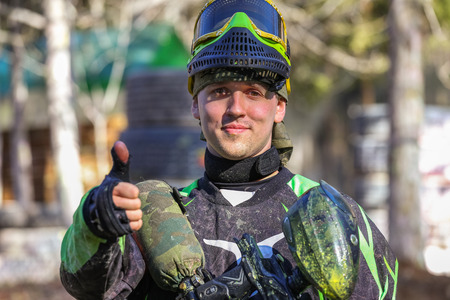 Smiling sportsman shows his thumbの写真素材