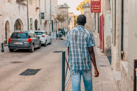 Avignon, Provence / France - September 27, 2018: African American man walking down the streetのeditorial素材