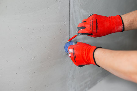 Installation and transfer of a place for an electrical outlet in a concrete wall with a cable recess...