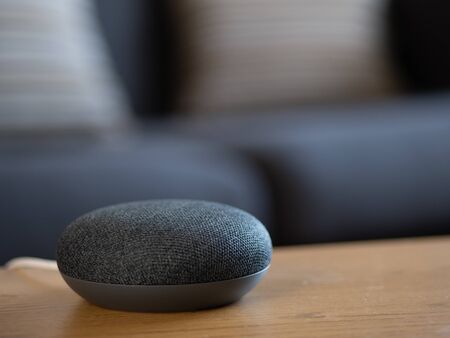 smart home voice activated speaker device in living room loungeの写真素材