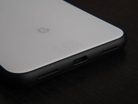 UK, October 2019: Pixel 4 white smart phone google logo and USB C charger portのeditorial素材