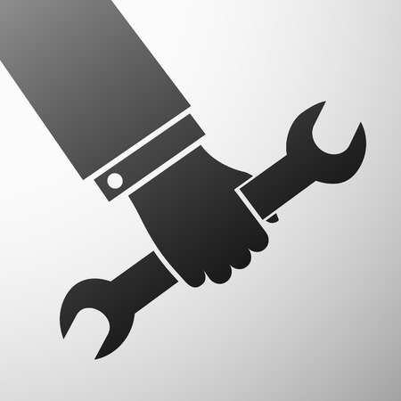 Human hand holding a wrench. のイラスト素材