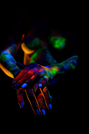 beautiful space neon body of a girls hands in space styleの写真素材
