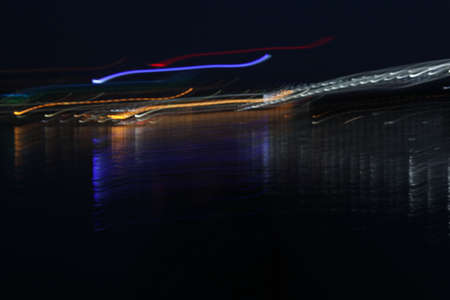 night city as it is beautiful lights on the background of the river