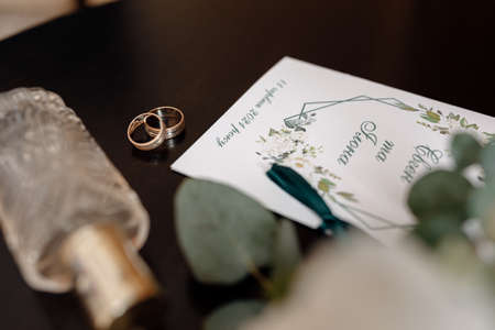 morning bride and groom with wedding rings close upの写真素材