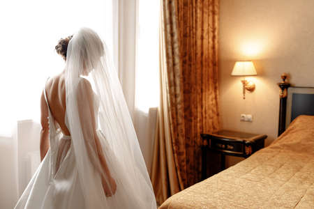 beautiful bride in white lush wedding dressの写真素材