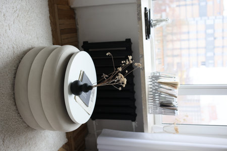 Interior of light living room with sofas, rattan table and soft carpetの写真素材