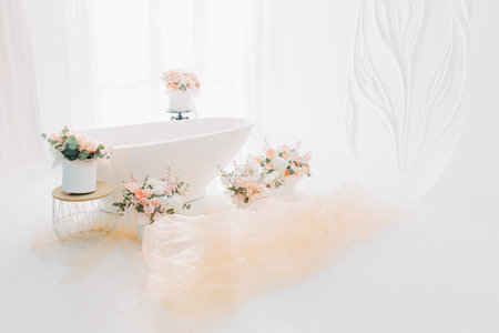 Interior of light living room with sofas, rattan table and soft carpetの写真素材