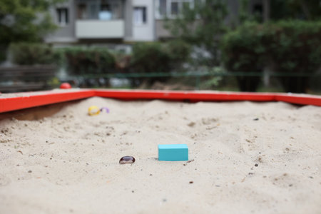 Sandbox with various outdoor toys. Sandbox for childrens games. Summer concept.の写真素材