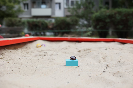 Sandbox with various outdoor toys. Sandbox for childrens games. Summer concept.の写真素材