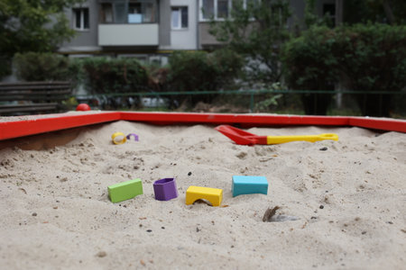 Sandbox with various outdoor toys. Sandbox for childrens games. Summer concept.の写真素材