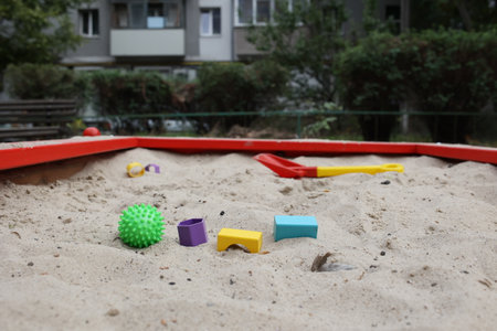 Sandbox with various outdoor toys. Sandbox for childrens games. Summer concept.の写真素材