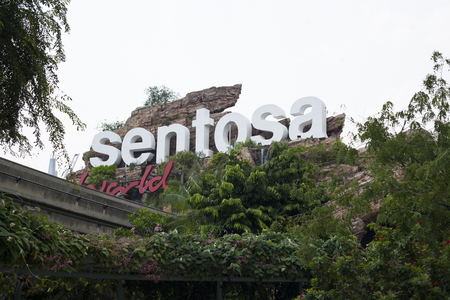 Singapore - 01 November 2014: Cable cars from Singapore to Sentosa Island and back. Theme park Sentosa, sand beach, resort, yacht marina, hotel and luxury residenceのeditorial素材