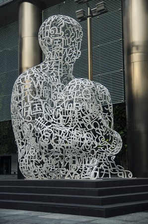 Singapore, Republic of Singapore - 01 November, 2014: Giant Sculpture of a Man Made of Letters by artist Jaume Plensaのeditorial素材