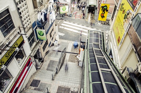 Hong Kong, China - November 11, 2014: Moving activity on busy street scene in cityのeditorial素材