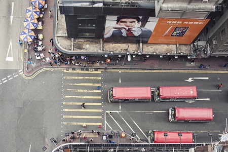 Hong Kong, China - November 13, 2014: Moving activity on busy street scene in cityのeditorial素材