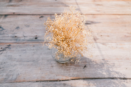 Vase of dry flower on the tableの写真素材