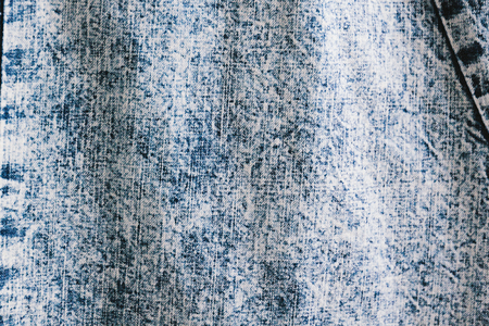 Pale blue denim jean textile in dye styleの写真素材