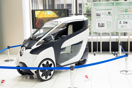 TOYOTA, JAPAN - NOVEMBER 13: Toyota iRoad displays at Toyota Kaikan Museum on November 13, 2015. Toyota i-Road is a three-wheeled electric vehicle in a size of motorcycle.のeditorial素材
